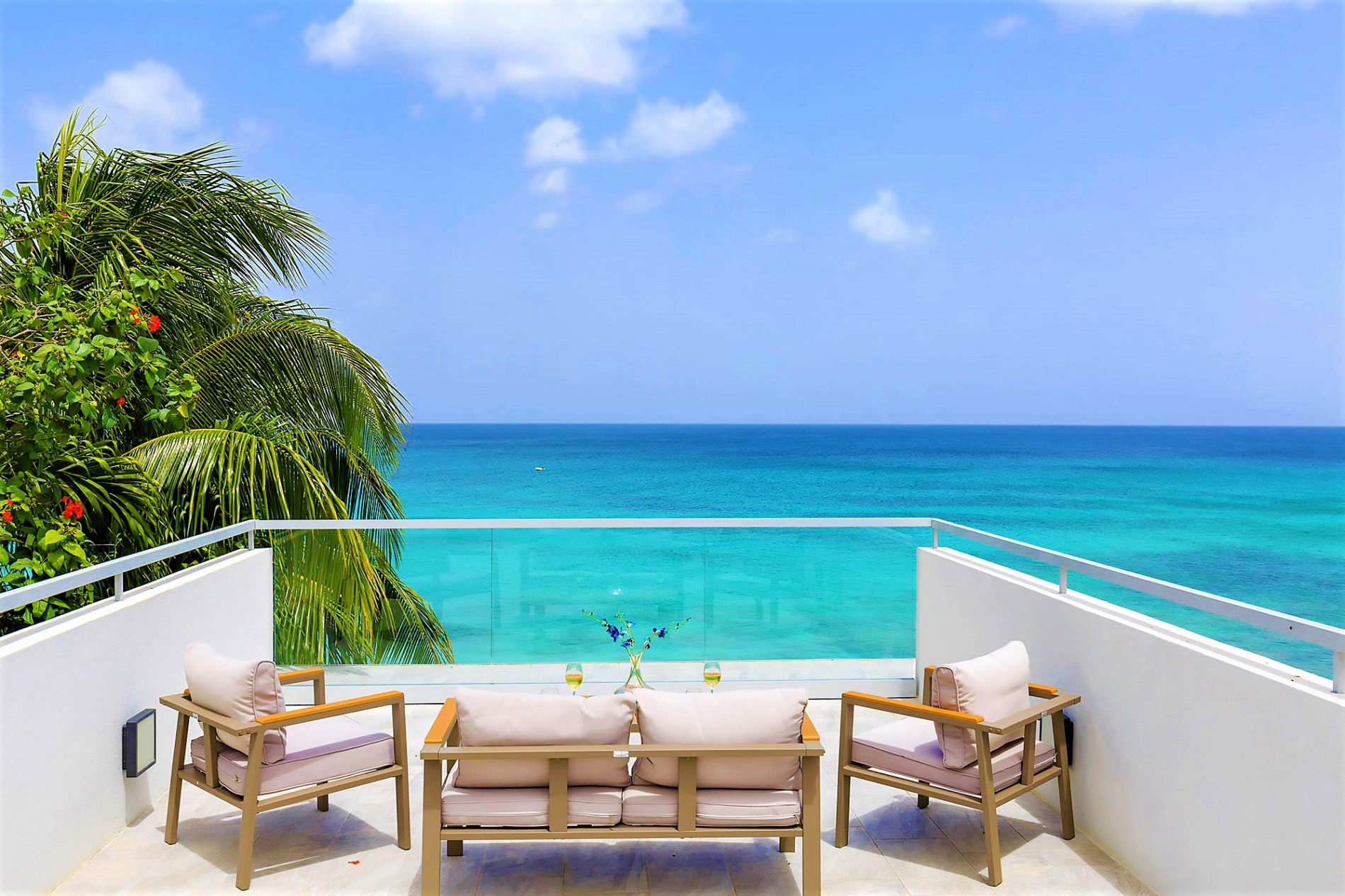 An elegant Barbados villa terrace overlooking the Caribbean Sea