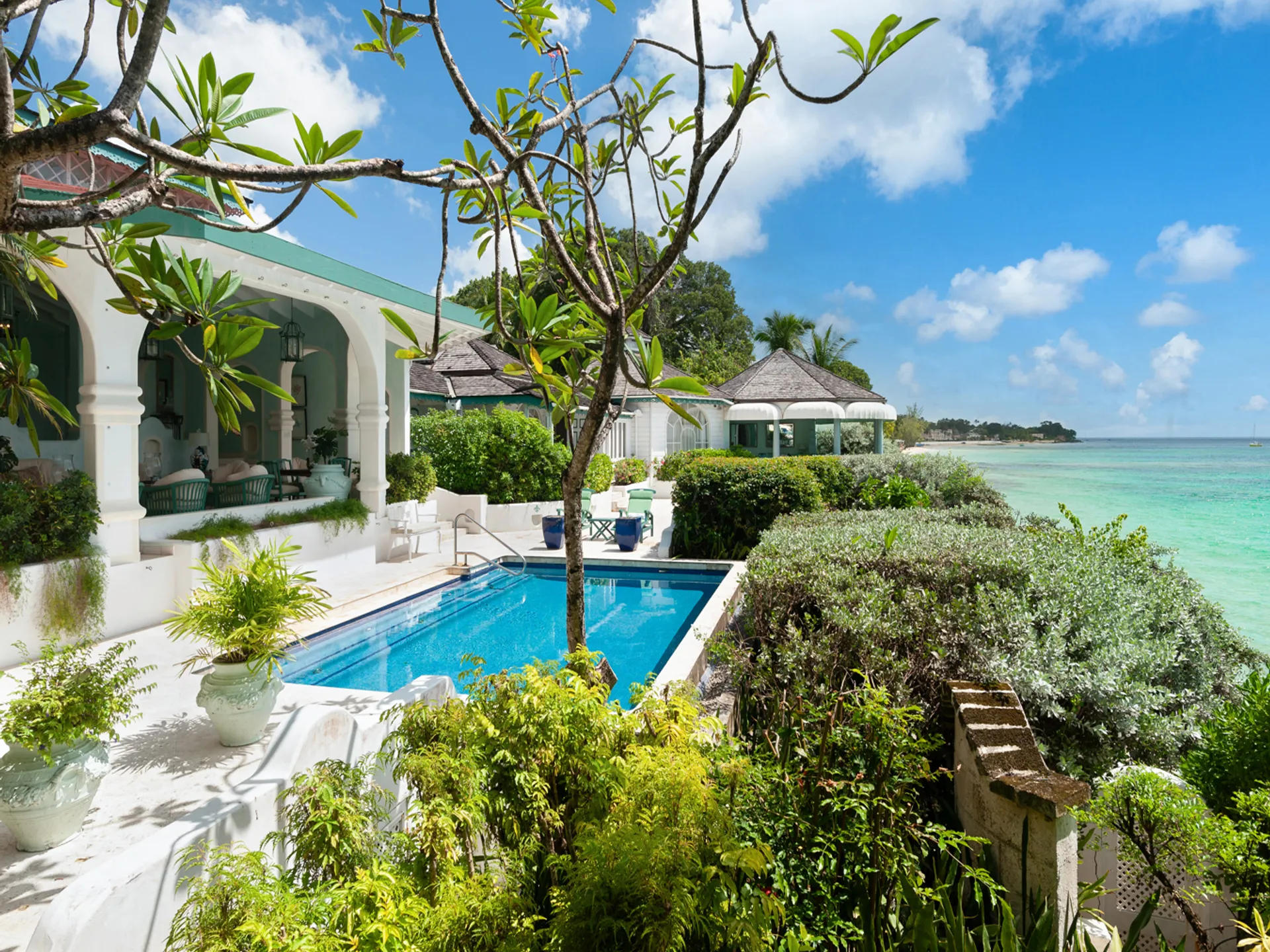 Elegant living room opening onto a Caribbean sea-view terrace